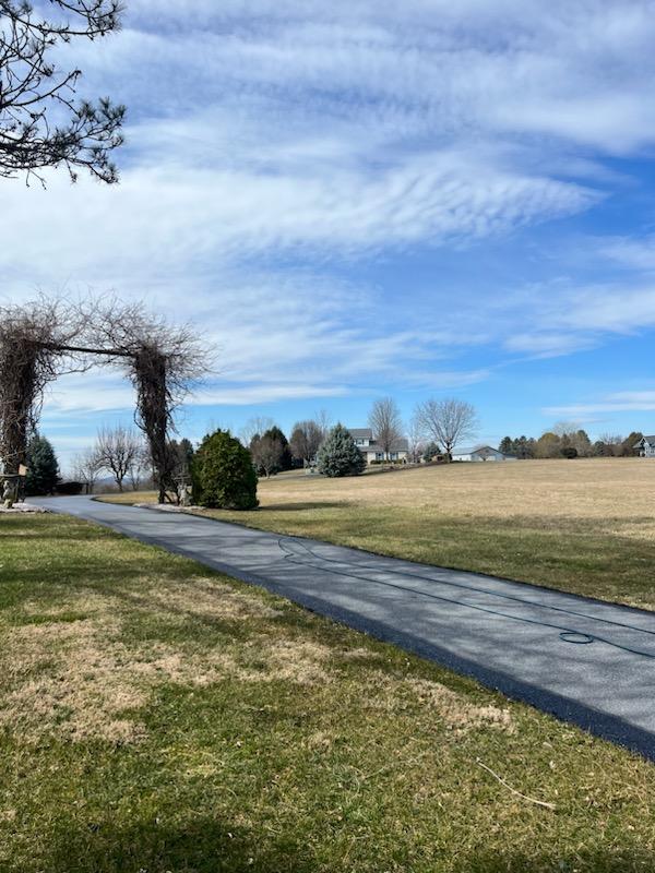 how to seal coat a driveway